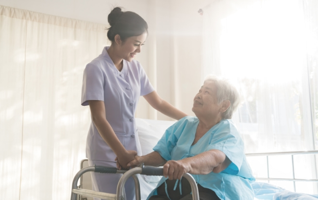 Nurse with elderly patient